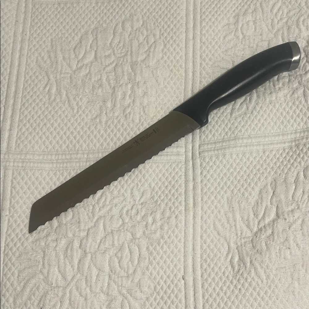 Sleek Black Serrated Bread Knife